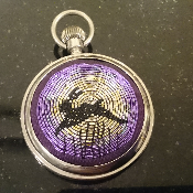 Hare on purple silk mounted in pocket watch case